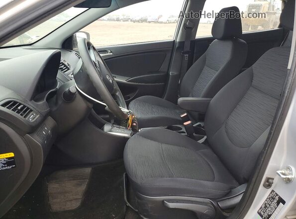 KMHCT5AE7GU274869 2016 HYUNDAI ACCENT Серебряный Вид салона спереди