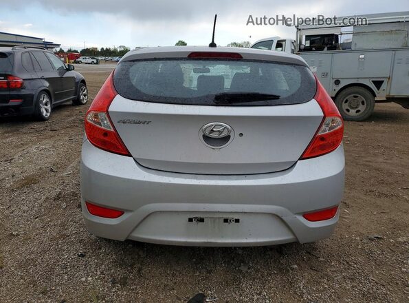 KMHCT5AE7GU274869 2016 HYUNDAI ACCENT Серебряный Вид сзади
