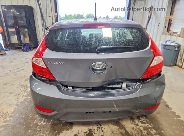 KMHCT5AE9HU343420 2017 HYUNDAI ACCENT Gray Widok z tyłu
