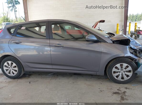 KMHCT5AEXGU255250 2016 HYUNDAI ACCENT Silver ხელსაწყოთა პანელის ხედი
