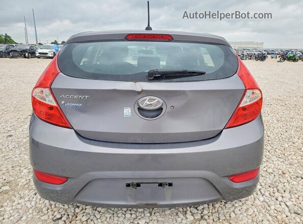 KMHCT5AEXHU335181 2017 HYUNDAI ACCENT Gray Rear view