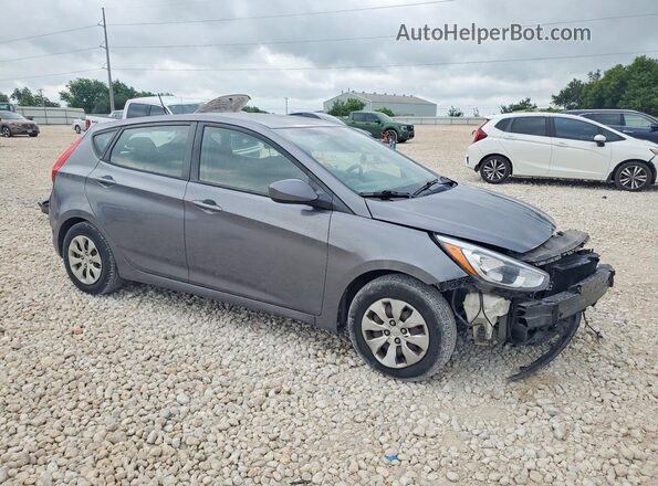 KMHCT5AEXHU335181 2017 HYUNDAI ACCENT Gray Front right