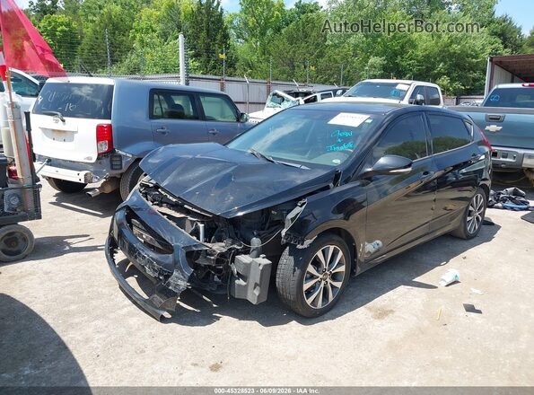 KMHCU5AE2HU354319 2017 HYUNDAI ACCENT Black Vista tres cuartos delantera izquierda