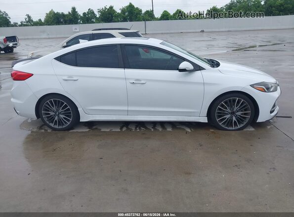 KMHD04LB2JU573283 2018 HYUNDAI ELANTRA Белый Вид задней части салона