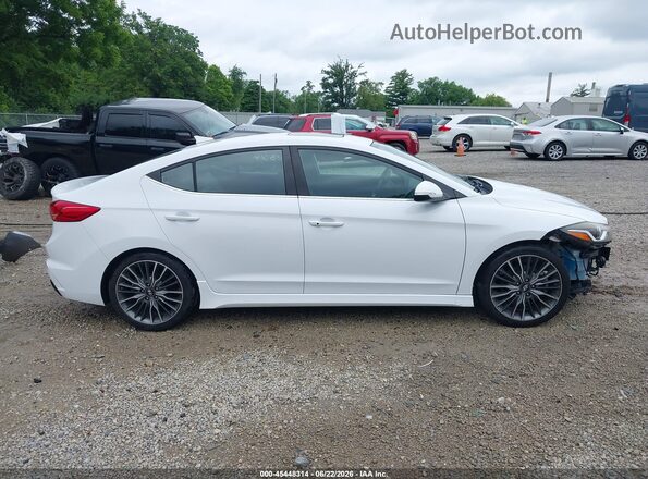 KMHD04LB8HU325937 2017 HYUNDAI ELANTRA White Вид задньої частини салону