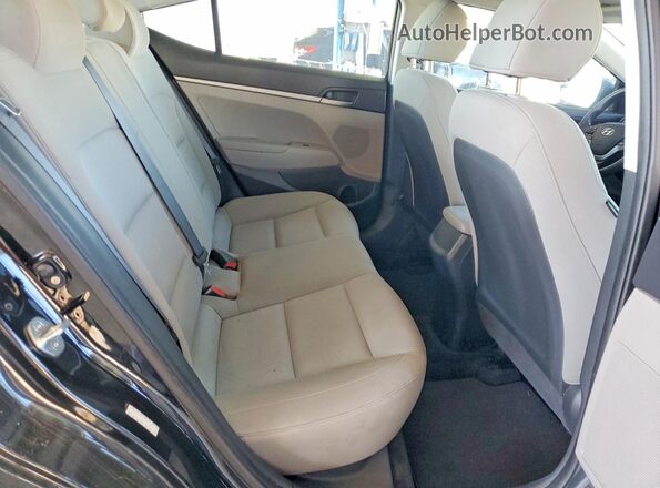 KMHD74LF6JU609457 2018 HYUNDAI ELANTRA Black Rear seats view