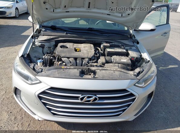 KMHD74LF9HU085375 2017 HYUNDAI ELANTRA Tan Вид ззаду