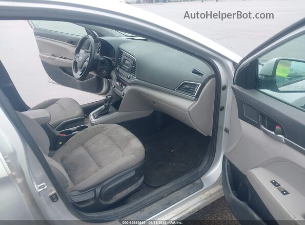 KMHD74LFXHU324707 2017 HYUNDAI ELANTRA Серебряный Вид салона спереди