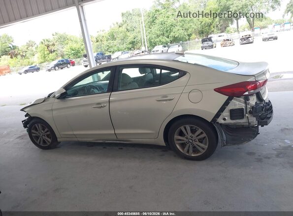 KMHD84LF0JU575738 2018 HYUNDAI ELANTRA Gold Widok wnętrza z tyłu