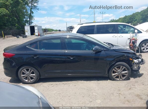 KMHD84LF0JU577571 2018 HYUNDAI ELANTRA Black Vista interior trasera