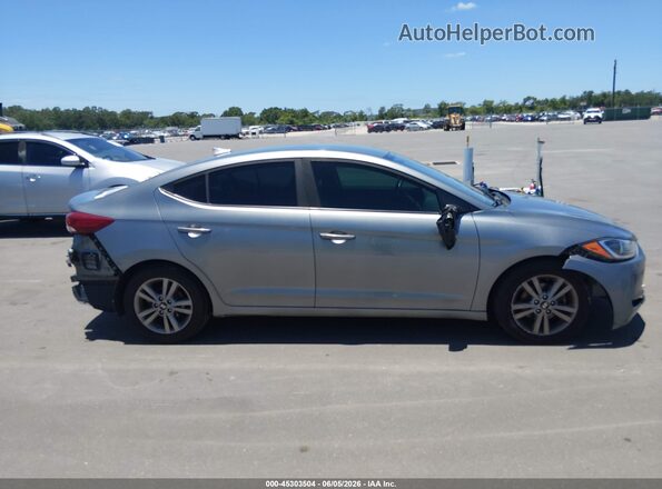KMHD84LF6JU537043 2018 HYUNDAI ELANTRA Gray Vista interior trasera