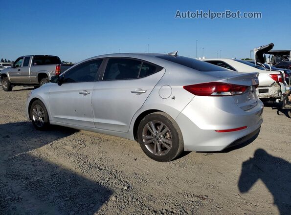 KMHD84LF9JU461012 2018 HYUNDAI ELANTRA Silver Trasero izquierdo