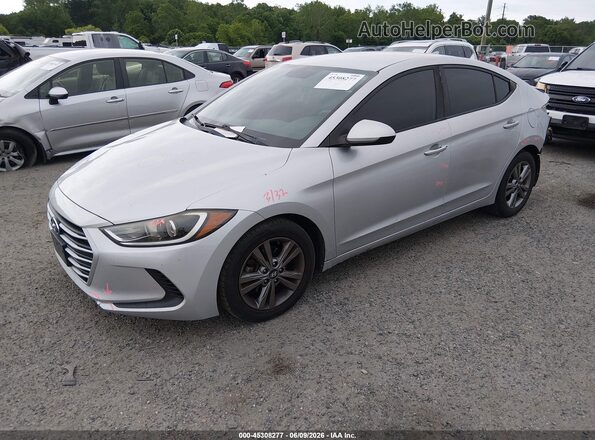 KMHD84LF9JU467781 2018 HYUNDAI ELANTRA Silver Vista tres cuartos delantera izquierda