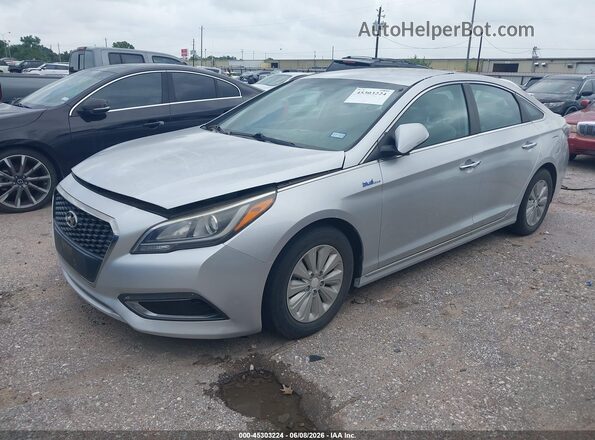 KMHE24L12GA010976 2016 HYUNDAI SONATA HYBRID Silver წინა მარცხენა ხედი სამი მეოთხედიდან