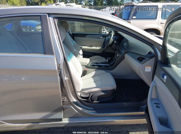 KMHE24L35HA074299 2017 HYUNDAI SONATA HYBRID Gray Vista interior delantera