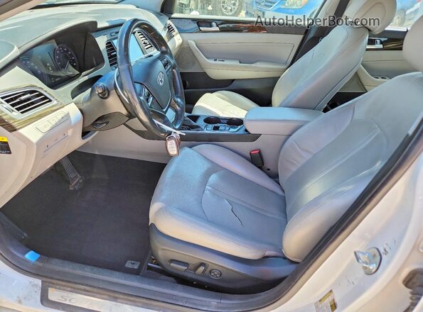 KMHE34L14GA033379 2016 HYUNDAI SONATA White წინა სალონის ხედი