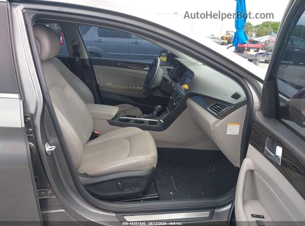 KMHE34L14HA057571 2017 HYUNDAI SONATA HYBRID Gray Widok wnętrza z przodu