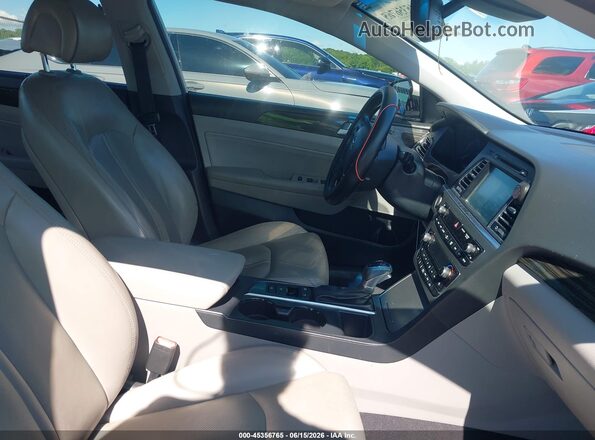 KMHE34L17GA033554 2016 HYUNDAI SONATA HYBRID Silver Widok wnętrza z przodu