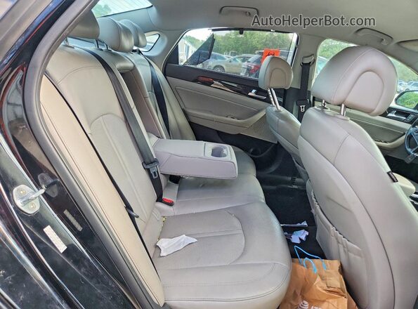 KMHE34L1XGA017719 2016 HYUNDAI SONATA Black Rear seats view