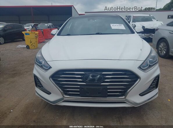 KMHE34L33KA088383 2019 HYUNDAI SONATA HYBRID White ხელსაწყოთა პანელის ხედი