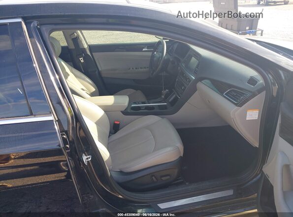 KMHE34L34HA067101 2017 HYUNDAI SONATA HYBRID Black Вид салону спереду