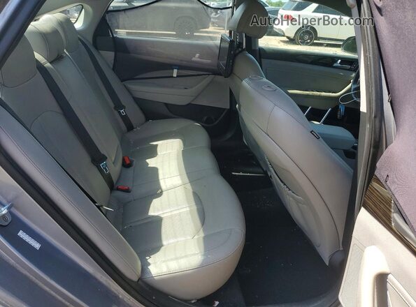 KMHE54L22HA045177 2017 HYUNDAI SONATA Silver Vista de los asientos traseros