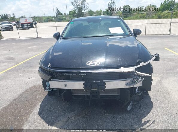KMHL64JAXRA386682 2024 HYUNDAI SONATA Black Vista interior trasera