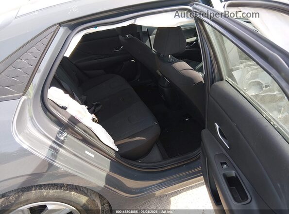 KMHLL4DG9RU710860 2024 HYUNDAI ELANTRA Gray VIN կոդի պիտակի տեսք