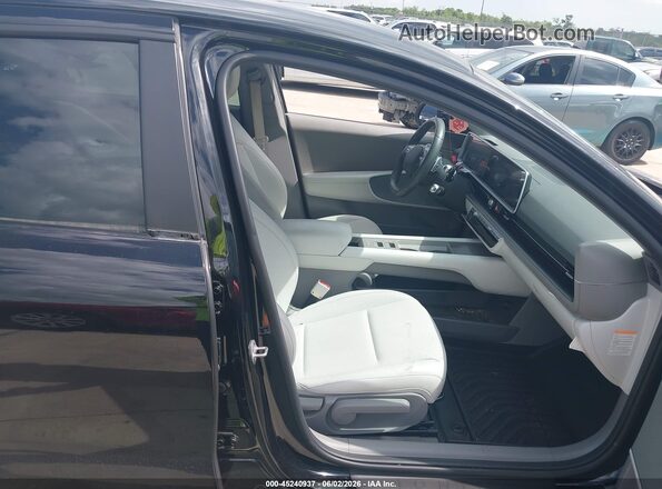 KMHM34AA7PA026683 2023 HYUNDAI IONIQ 6 Black Front interior view