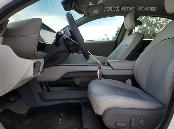 KMHM34AC5PA048716 2023 HYUNDAI IONIQ White Вид салону спереду