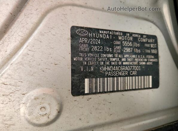 KMHM34AC6RA077001 2024 HYUNDAI IONIQ Silver Widok komory silnika