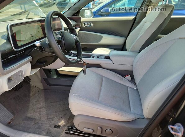 KMHM34ACXPA038523 2023 HYUNDAI IONIQ Green Вид салону спереду