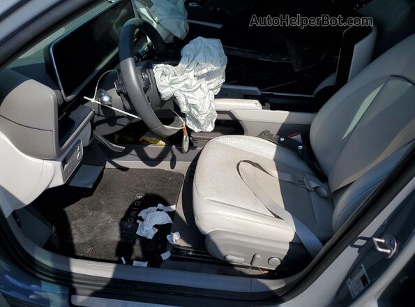KMHM54AA3RA064084 2024 HYUNDAI IONIQ Gray Front interior view