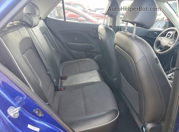 KMHRC8A30PU236216 2023 HYUNDAI VENUE Blue Rear seats view