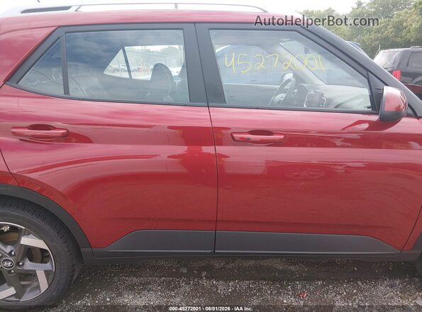 KMHRC8A34SU416629 2025 HYUNDAI VENUE Red Vista interior trasera