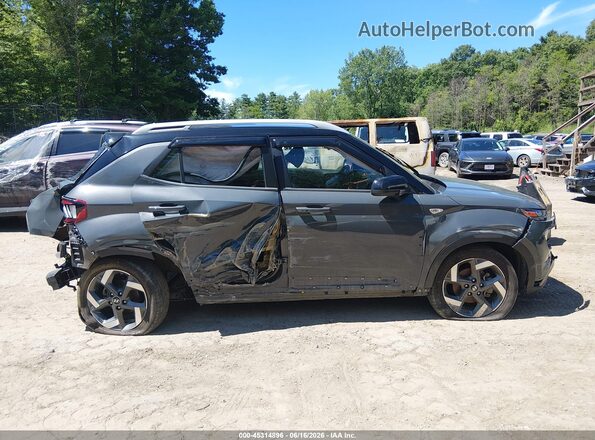 KMHRC8A36RU279929 2024 HYUNDAI VENUE Gray Rear interior view