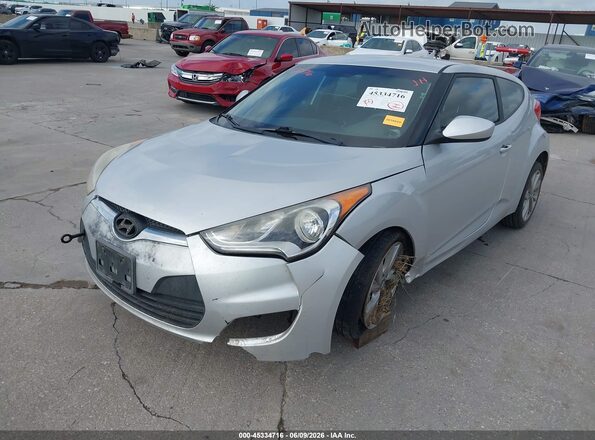 KMHTC6AD6GU297816 2016 HYUNDAI VELOSTER Silver Vista tres cuartos delantera izquierda