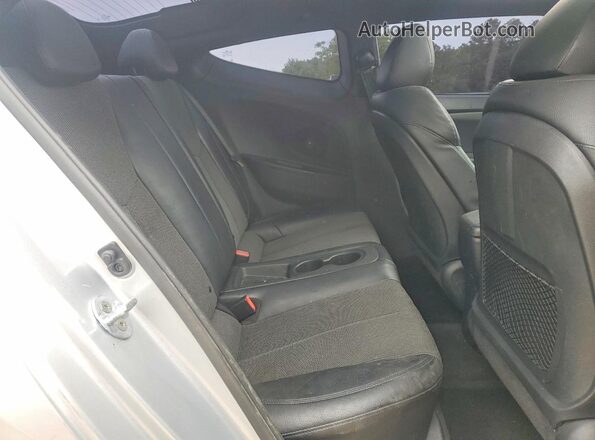 KMHTC6AD9GU282582 2016 HYUNDAI VELOSTER Silver Rear interior view