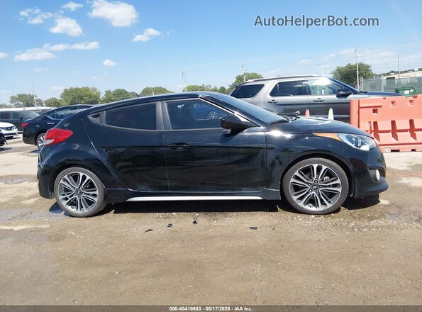 KMHTC6AE9GU252717 2016 HYUNDAI VELOSTER Black უკანა სალონის ხედი