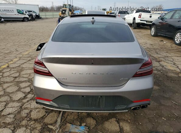 KMTG34TA7PU109979 2023 GENESIS G70 Серебряный Вид сзади