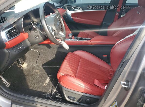 KMTG34TA7PU109979 2023 GENESIS G70 Серебряный Вид салона спереди