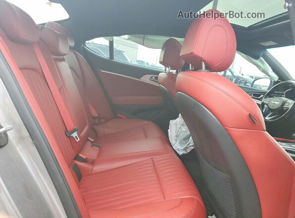 KMTG34TA7PU109979 2023 GENESIS G70 Серебряный Вид задних сидений