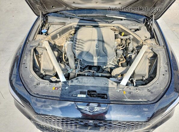 KMTG54SE7RU141882 2024 GENESIS G70 Black Vista interior trasera