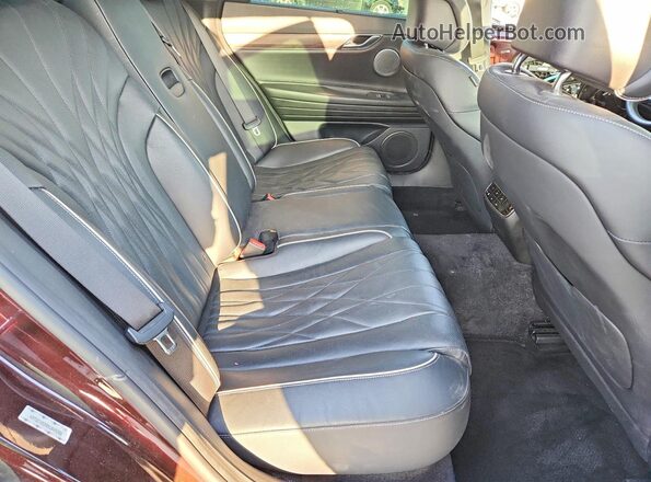 KMTGC4SD9MU049386 2021 GENESIS G80 Maroon Vista de los asientos traseros