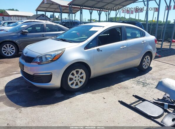 KNADM4A32G6660695 2016 KIA RIO Silver Առջևի ձախ երեք քառորդ տեսարան