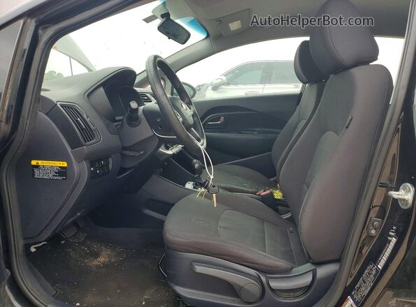 KNADM4A34H6012549 2017 KIA RIO Black Front interior view