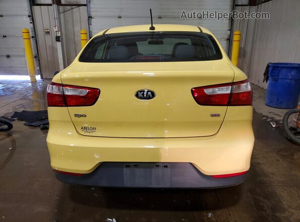 KNADM4A3XG6680578 2016 KIA RIO Yellow Հետևի տեսք