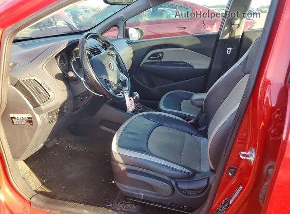 KNADN4A32G6569830 2016 KIA RIO Red Widok wnętrza z przodu