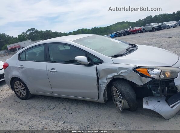 KNAFX4A65G5446252 2016 KIA FORTE Серебряный Вид задней части салона