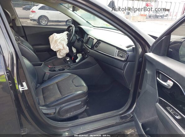 KNDCC3LC1H5069791 2017 KIA NIRO Dark Brown Widok wnętrza z przodu